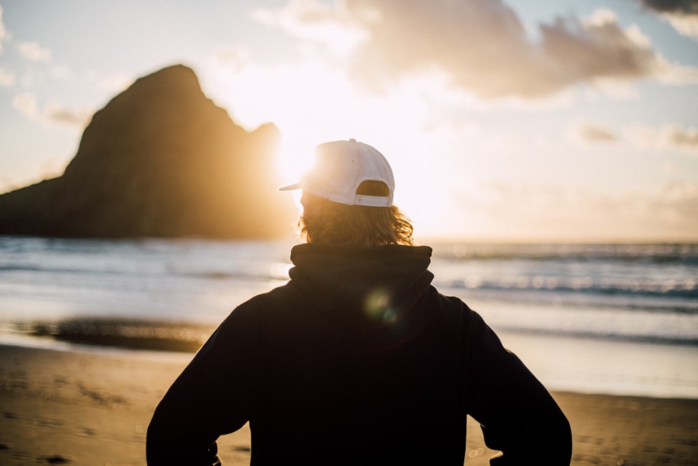 man standing on shore