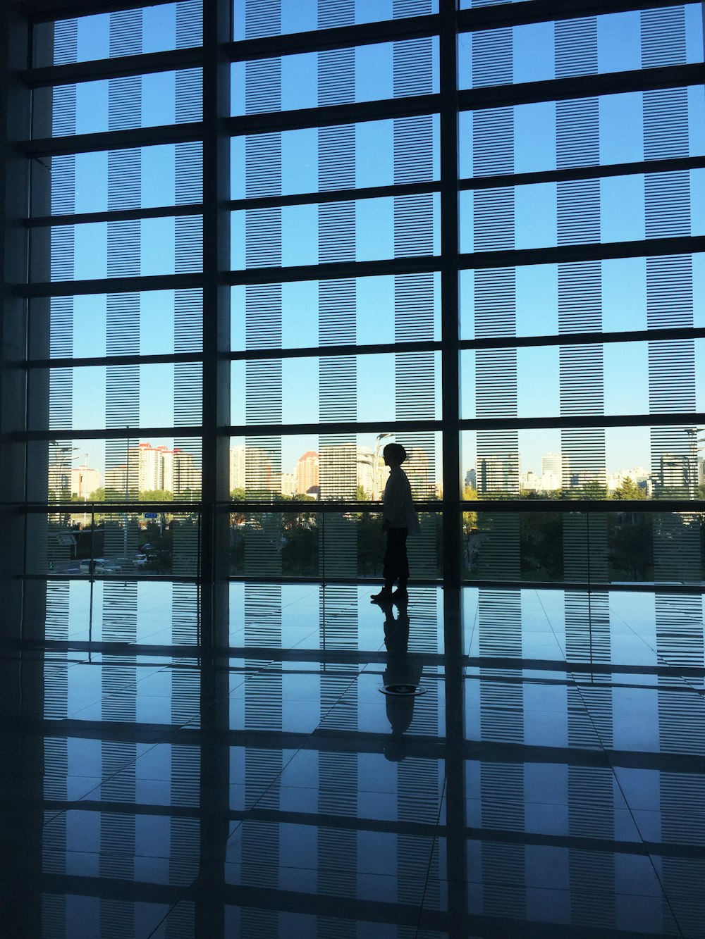 woman walking on building