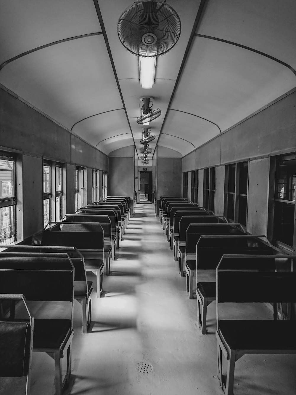 grayscale photo of chairs