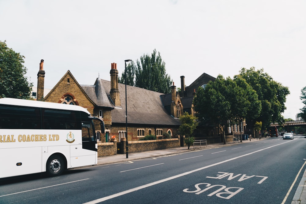 bus at the road near architectural building