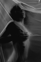 A tasteful, shadowed silhouette representing the discreet and personal nature of our NSFW clips.