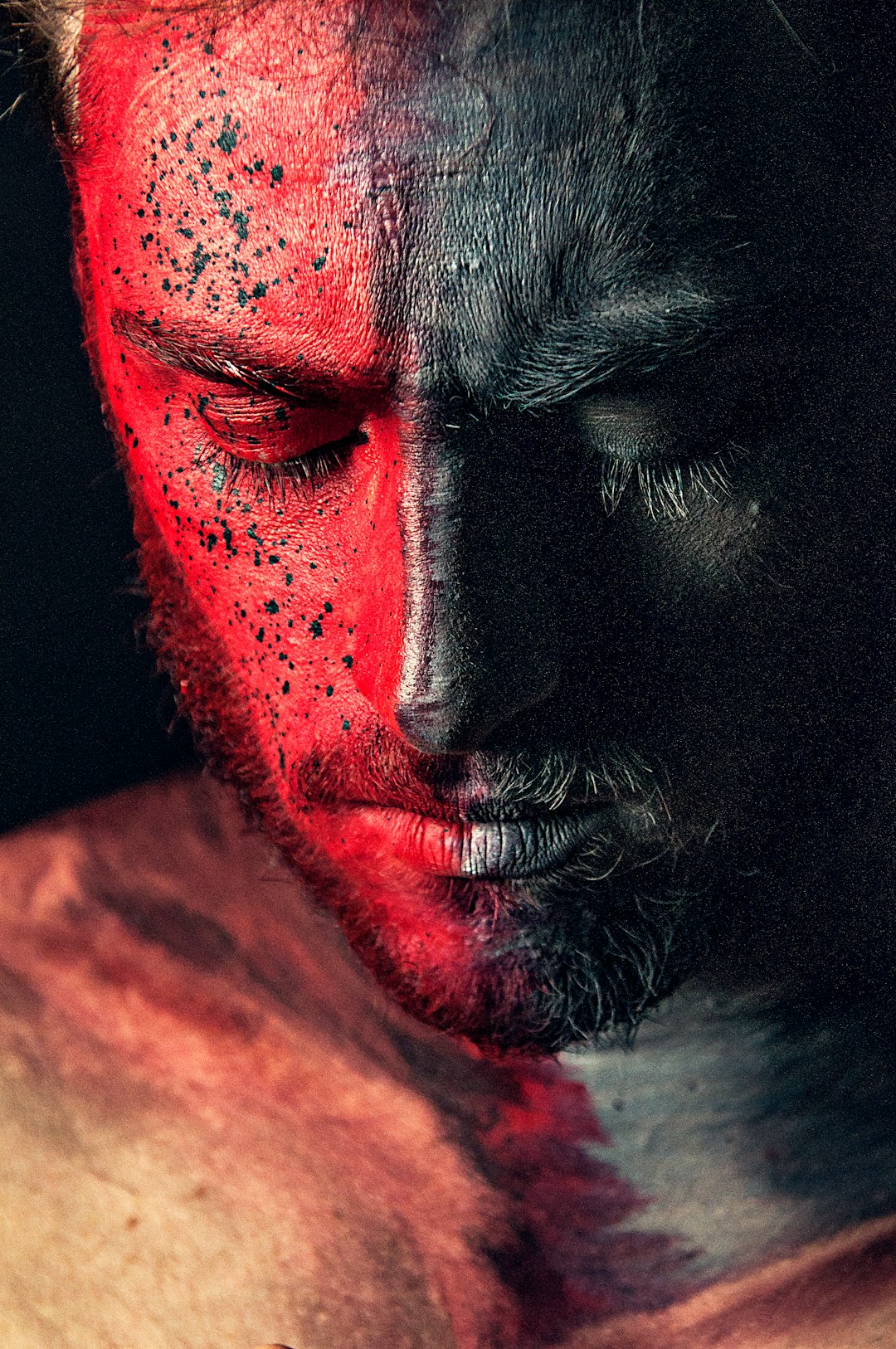 man portrait red and black paint