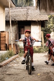 boy riding on bike