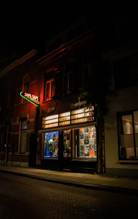 Exterior view of Samy's Brothers Mini Market with welcoming signage and bright lighting.