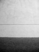 Close-up of a minimalist black and white conceptual photo edit with subtle textures.