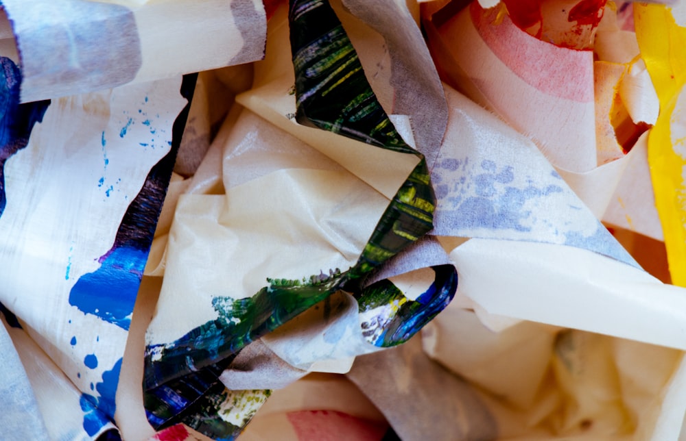 black, green, and blue floral textile