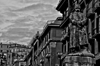 Black and white photo of four Brazilian soldiers from World War II standing proudly in uniform.