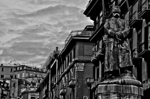 Black and white photo of four Brazilian soldiers from World War II standing proudly in uniform.