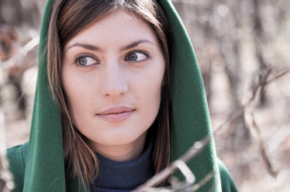 woman wearing blue turtleneck top