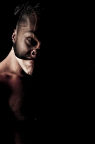 An expressive half-body character design with rich textures and vibrant lighting emphasizing mood.