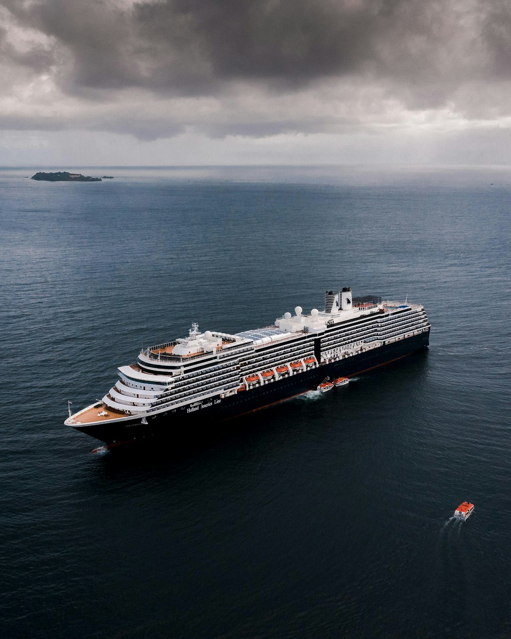 black and white cruise ship sailing on sea