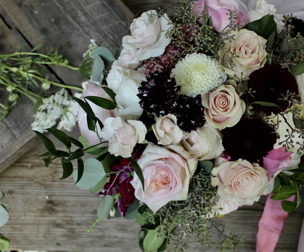 white and pink petaled flower bouquet