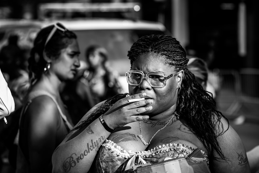 grayscale photo of woman wearing eyeglasses