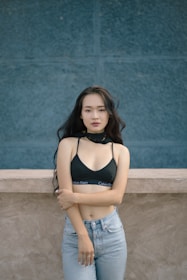 woman standing in front of wall