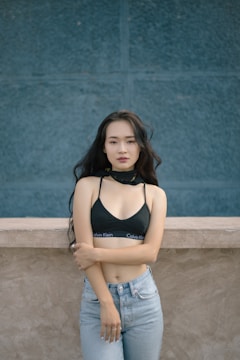 woman standing in front of wall