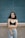 woman standing in front of wall