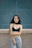 woman standing in front of wall