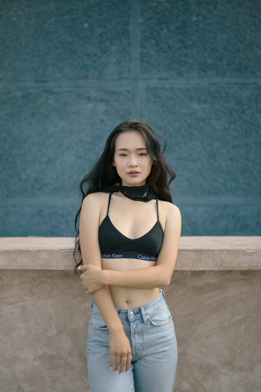 woman standing in front of wall