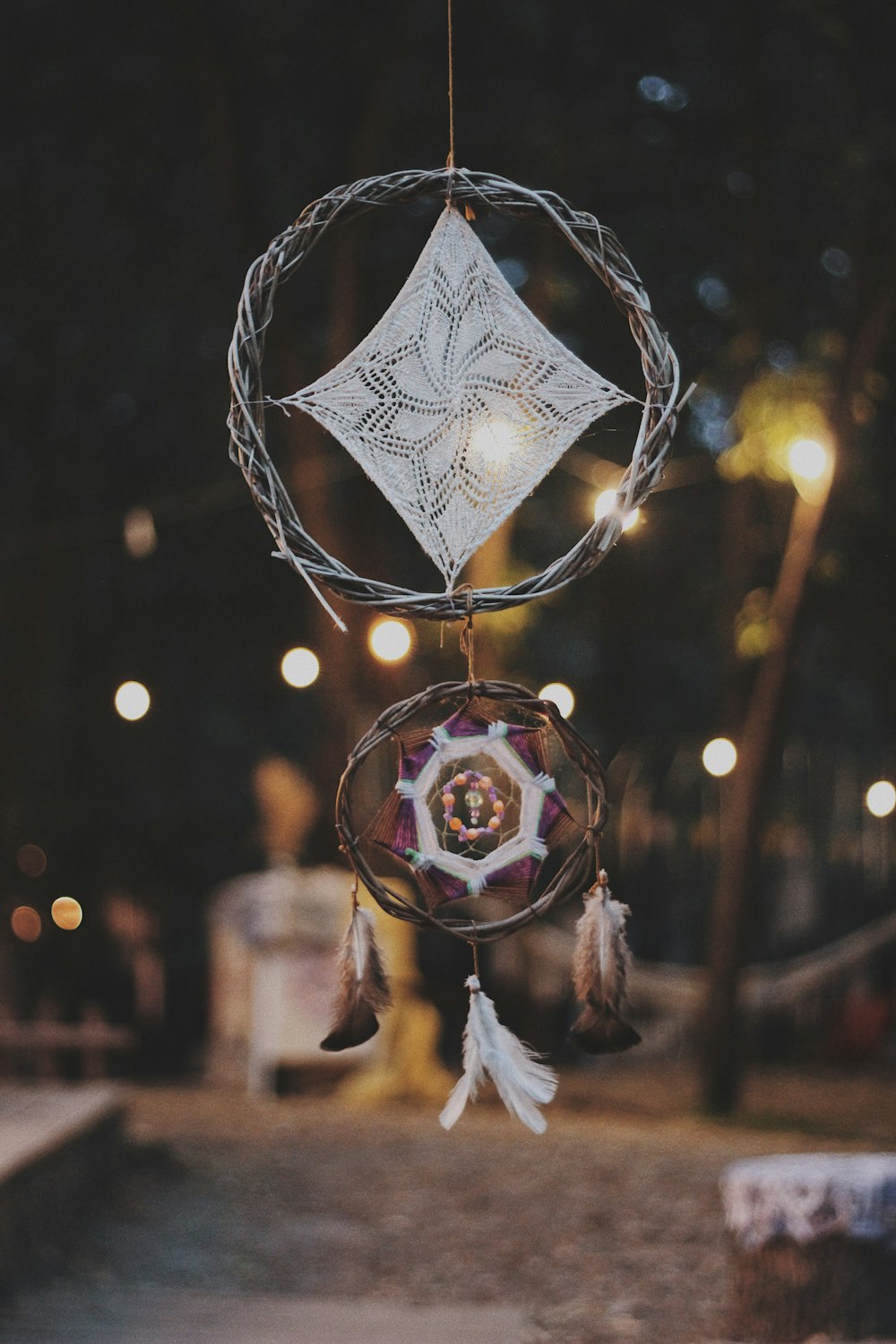 selective focus photography of dreamcatcher