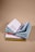 open book on top of several stacked books