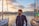 man standing on yacht facing left