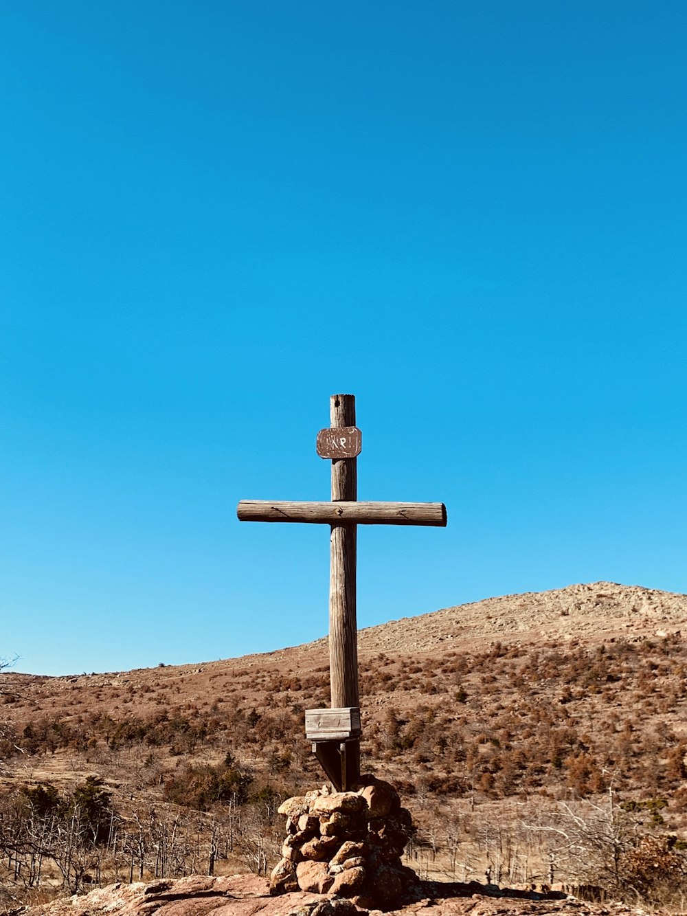 Croix sur le champ paysager