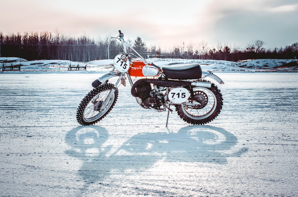 white and black standard motorcycle