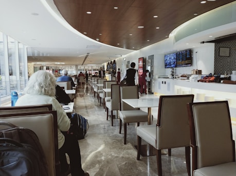 A sleek, modern international business lounge with the logo 'xd68' prominently displayed.