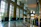 Clean and bright commercial lobby with fresh plants and polished floors.