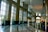 Bright and inviting wellness center lobby with natural light and plants.