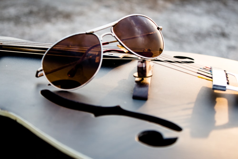 brown sunglasses with stainless steel frames