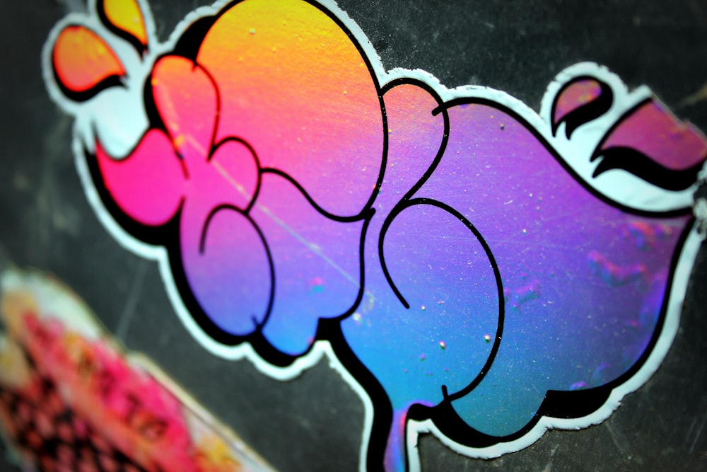 a close up of a sticker on a skateboard