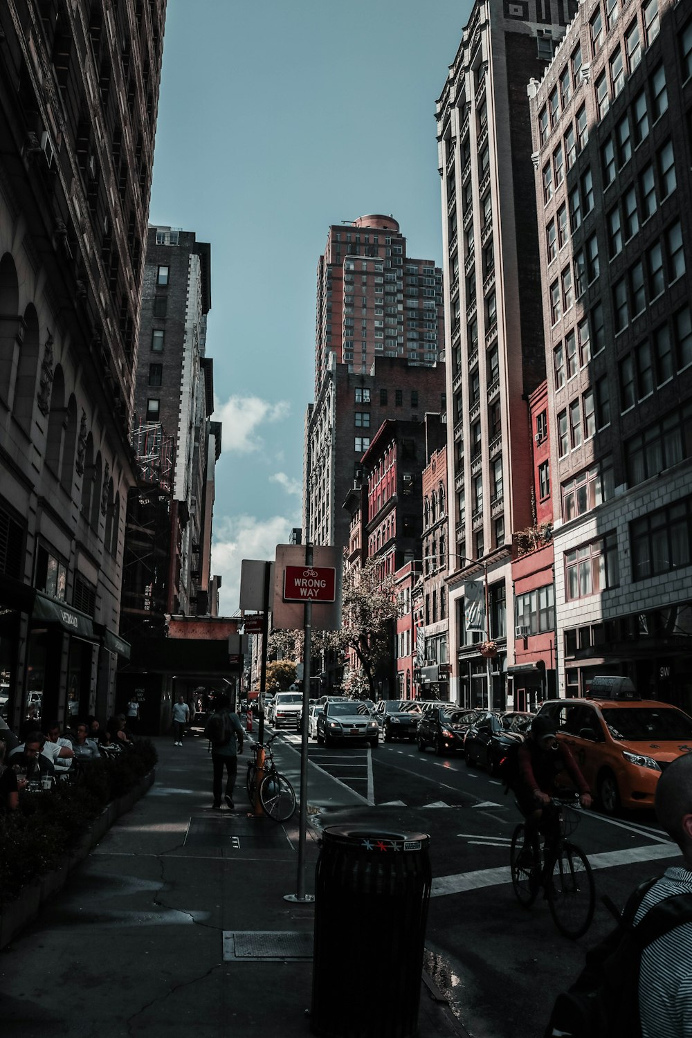 people walking on sidewalk during daytime