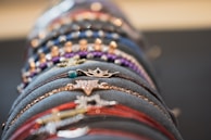 A collection of stylish bracelets on a soft background.