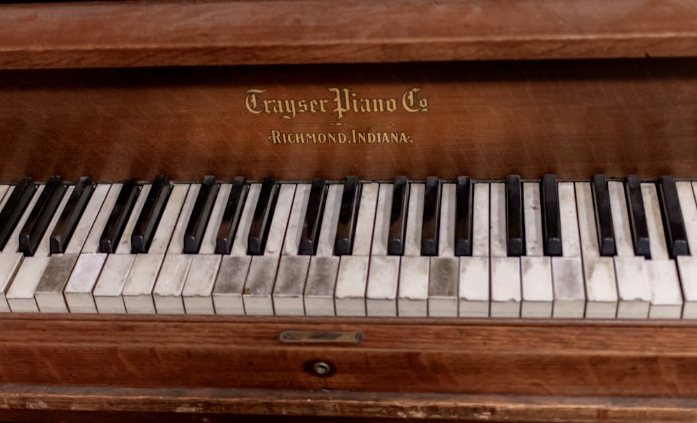 brown upright piano