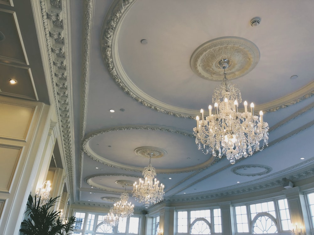 glass chandeliers in room