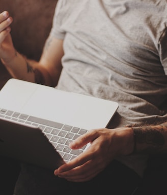 person white laptop computer