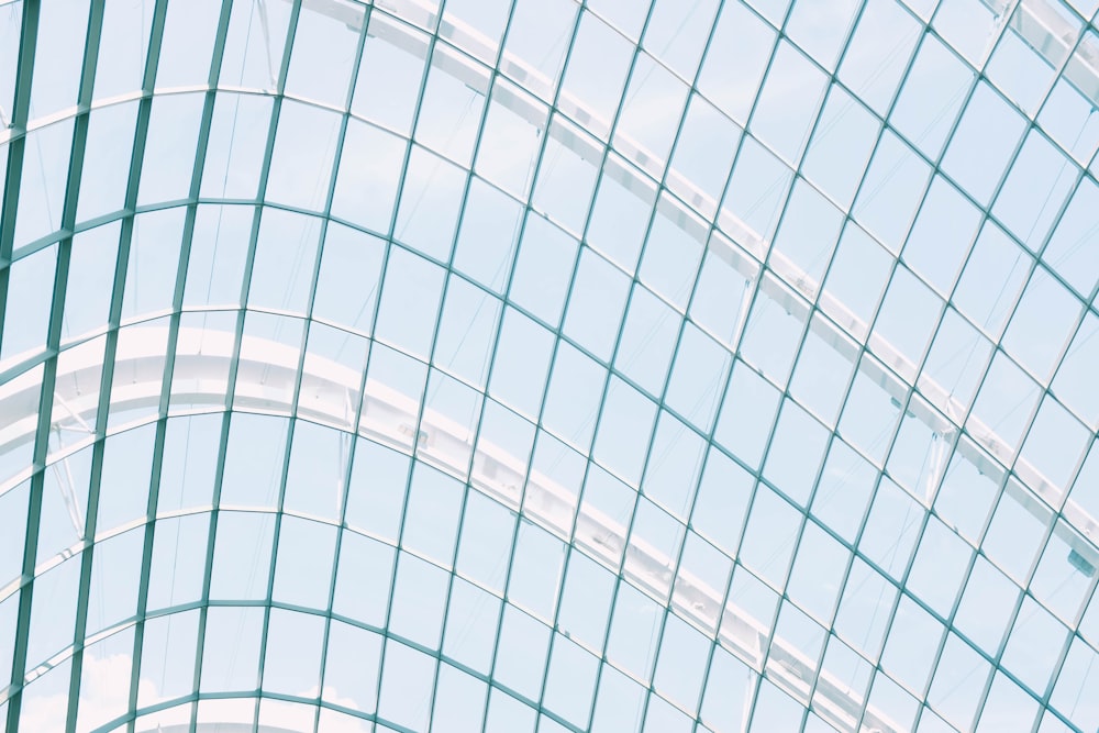 low-angle photography of glass dome building ceiling