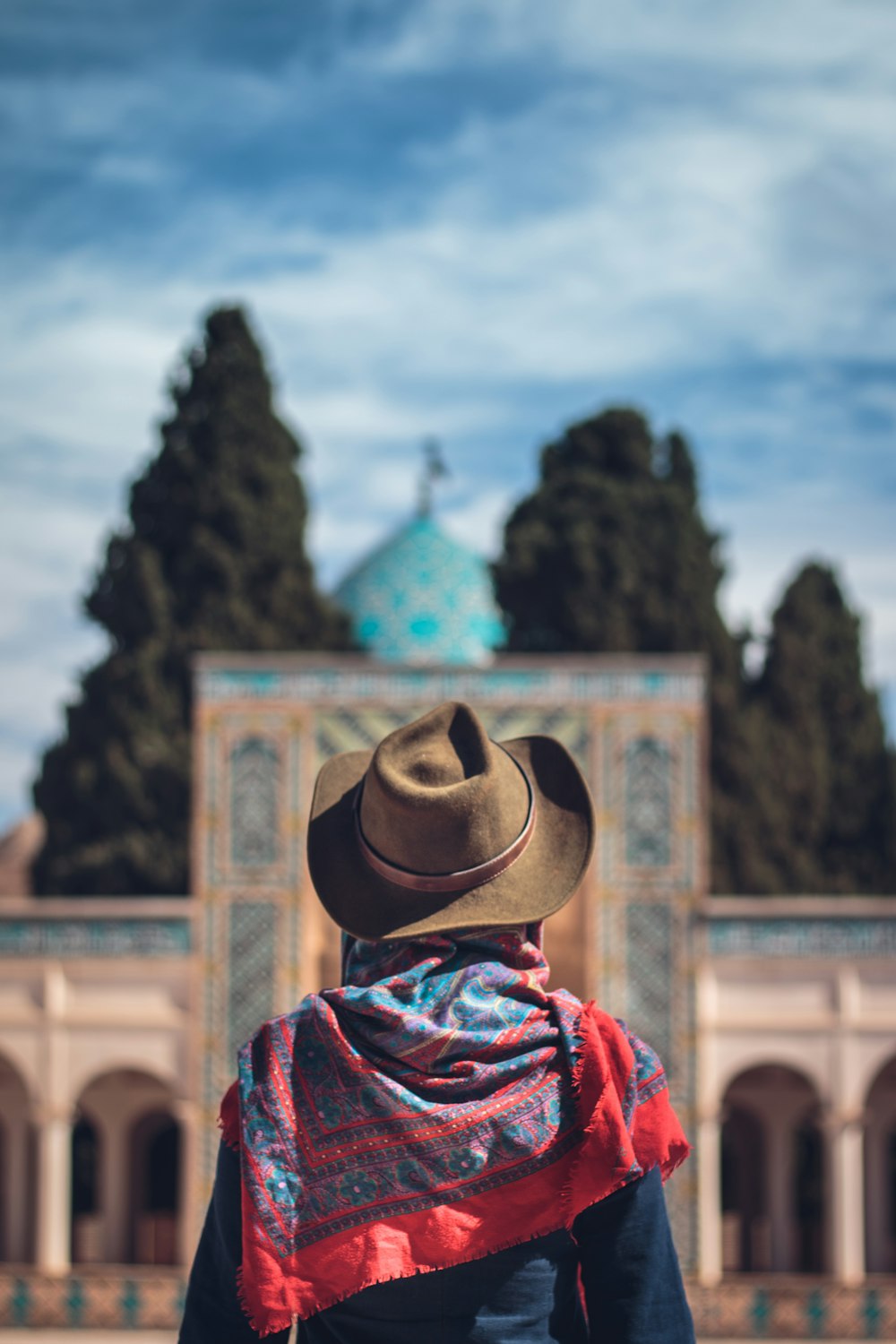 woman wearing brown cowboy hat