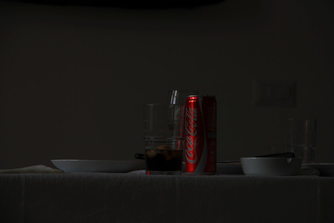 Coca Cola can on table