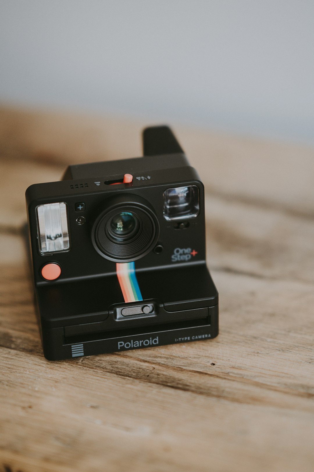 selective focus photography of Polaroid camera