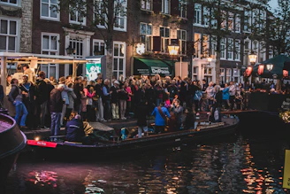 A cozy gathering of community members enjoying an outdoor concert near the canals.