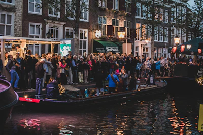 A cozy gathering of community members enjoying an outdoor concert near the canals.