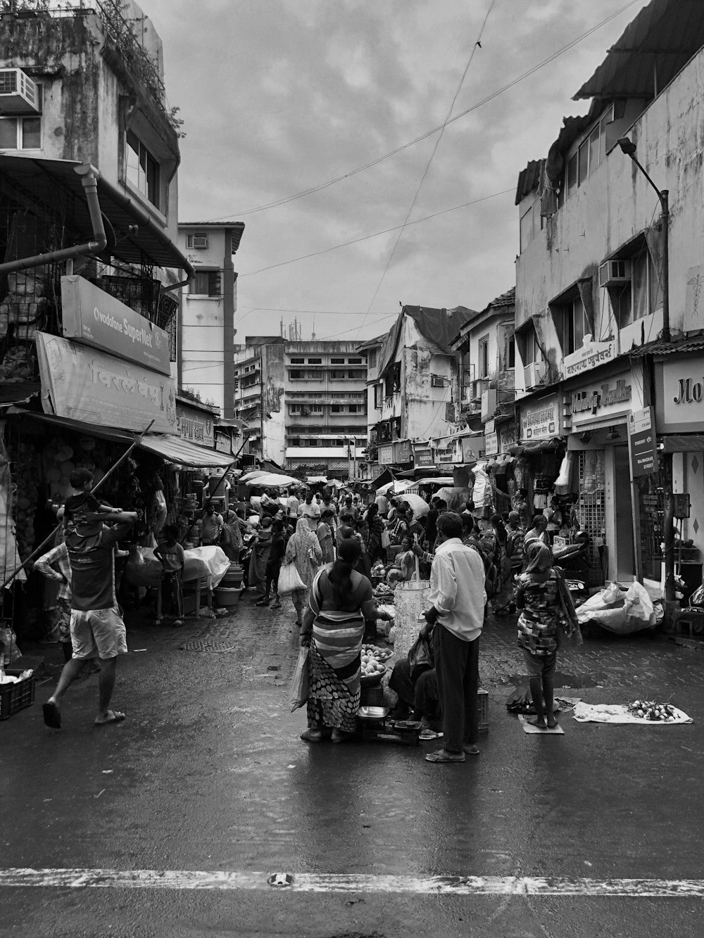 grayscale photography of people on road