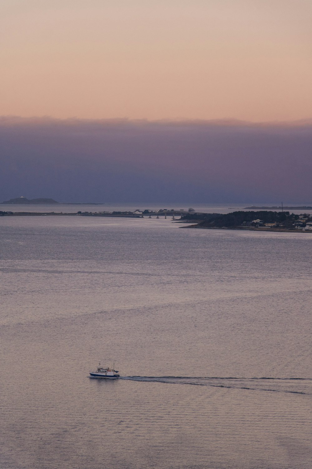 boat on body of water during golden hour