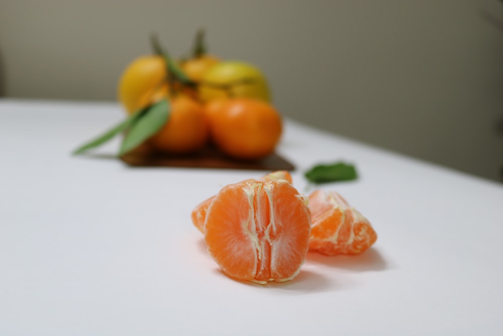 peeled orange fruit shallow focus photography