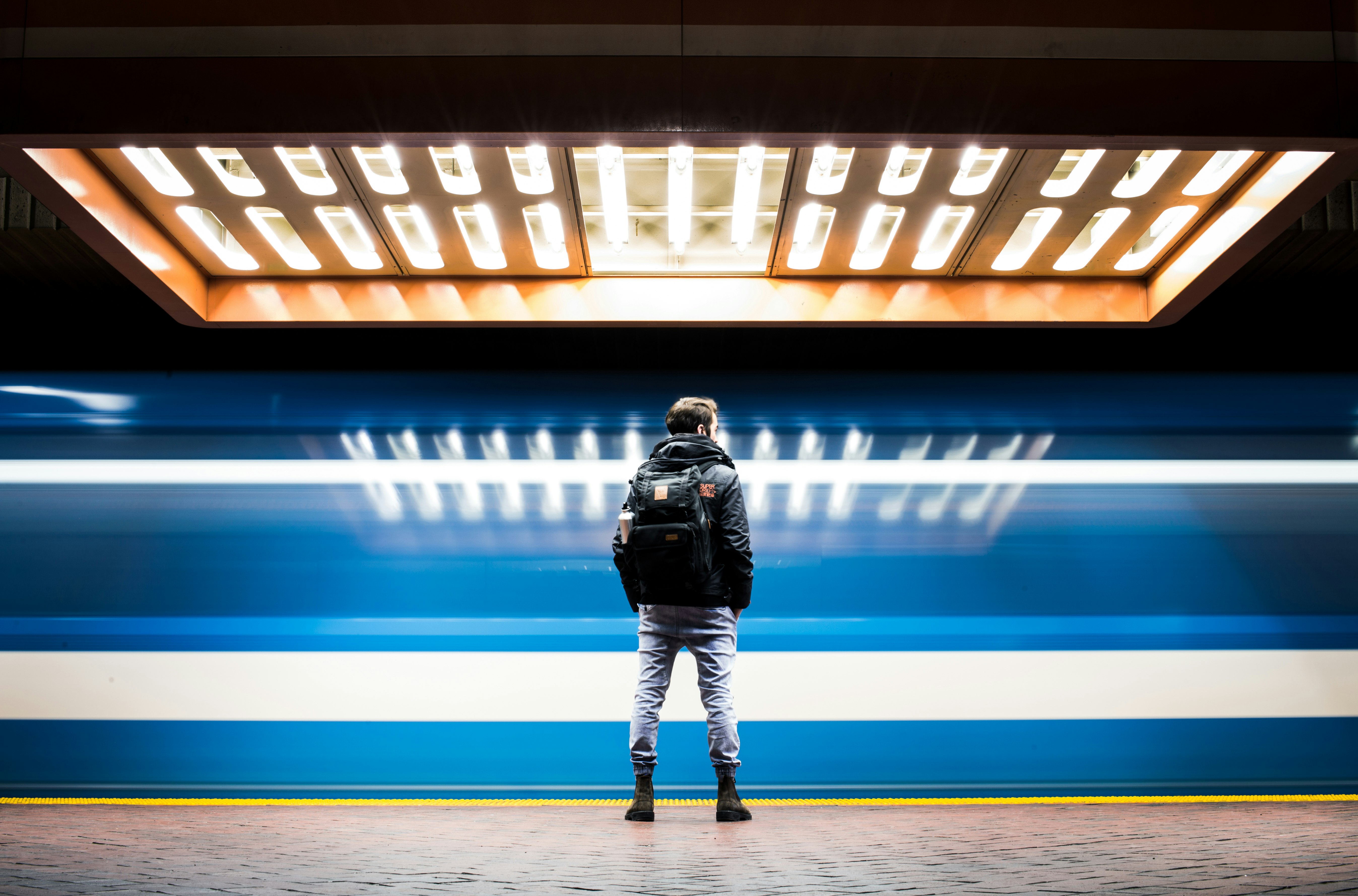 man in black backpack