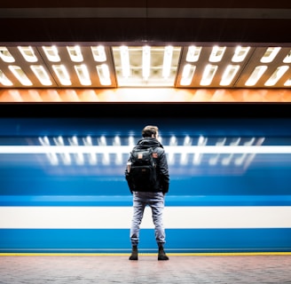 man in black backpack