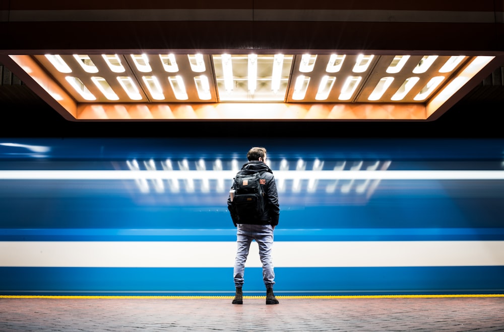 man in black backpack