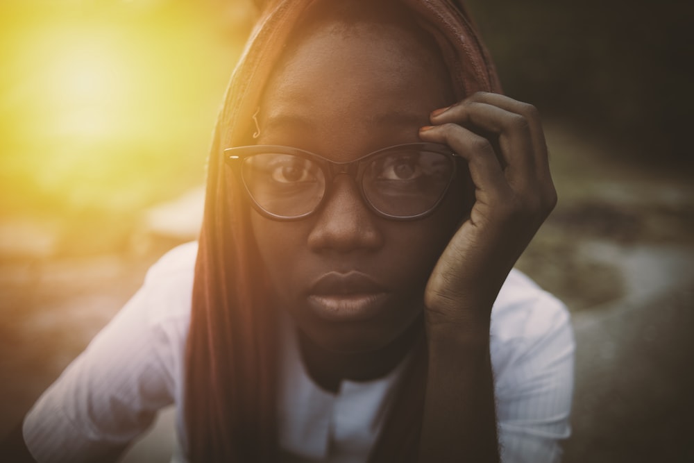 woman wearing black framed eyeglasses